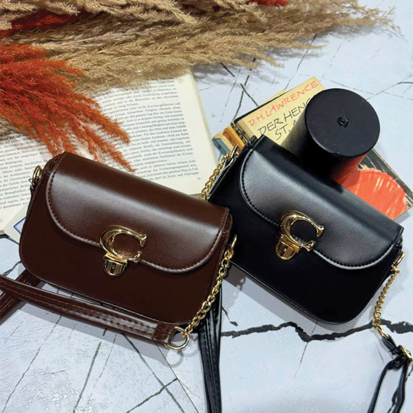 کیف چرمی قفل دار مدل بند کارتیر دار زنانه